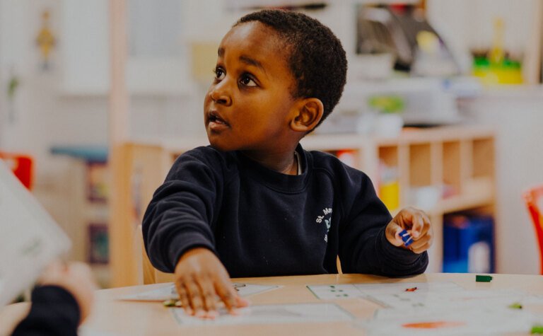 Three year old boy at St Margaret's co-educational independent school in Bushey Hertfordshire