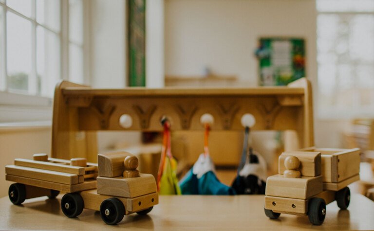 Wooden toys on display in nursery school offering 15 hours funding at St Margaret's School