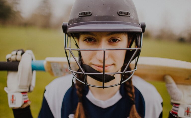 St Margaret's senior school sports scholarship pupil in cricket gear