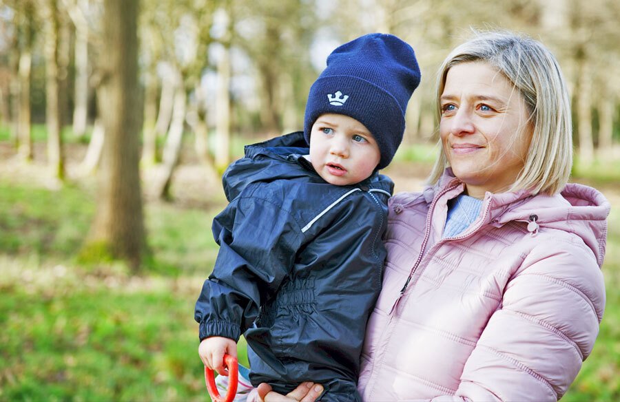 St Margaret's School Head with young pupil on school grounds