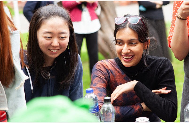 Two of St Margaret's Sixth Form pupils chatting at Leaver's party