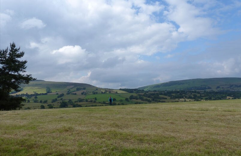 Panoramic view of countryside with one student on their Duke of Edinburgh's expedition