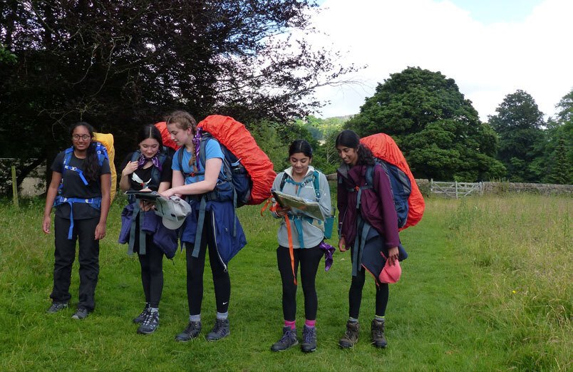 A group of St Margaret's School pupils map reading on the expedition section of their DofE award