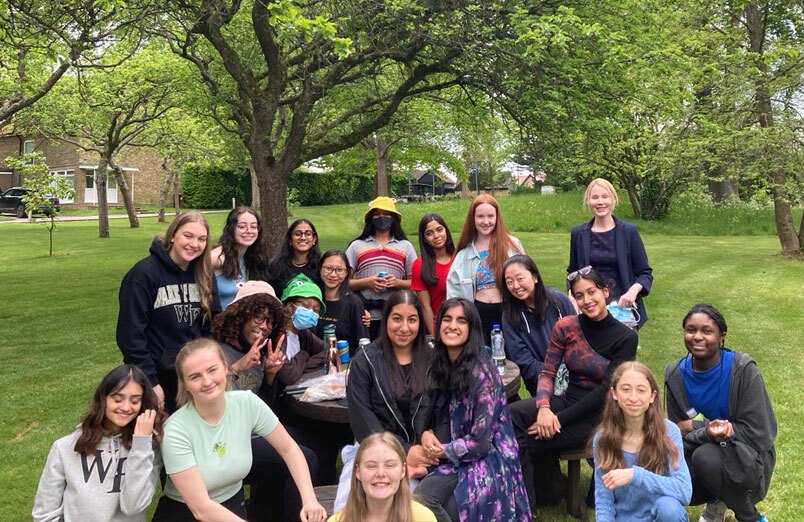 St Margaret's Year 13 Sixth Form Last Day at School celebrating in orchard