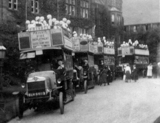 Four double decker buses taking St Margaret's School pupils on a school trip in 1914